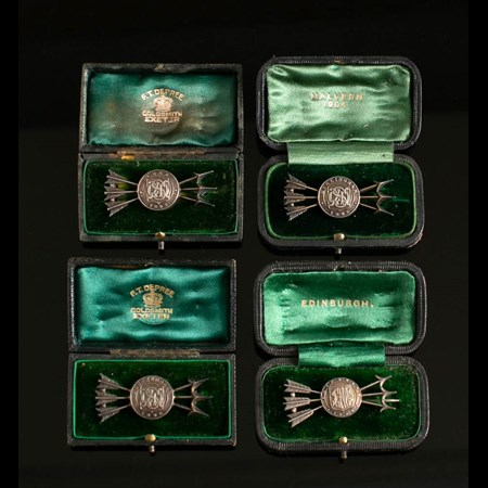 Four Victorian White Metal Archery Trophy Brooches Each In The Form Of A Monogrammed Target