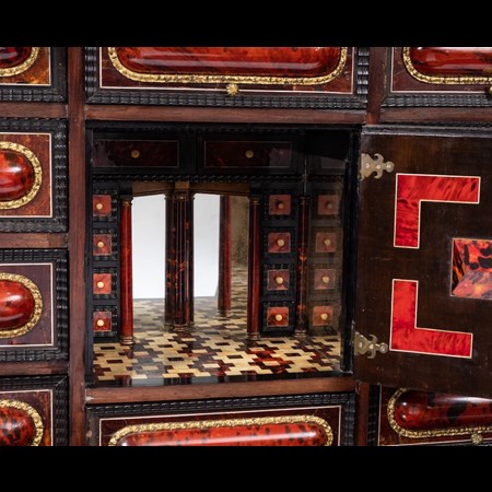 A 19Th Century Flemish Simulated Scarlet Tortoiseshell, Ebony And Ivory Inlaid Architectural Cabinet