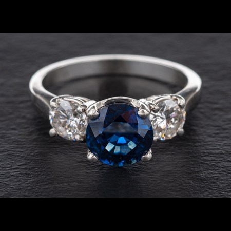 A Sapphire And Diamond Three Stone Ring